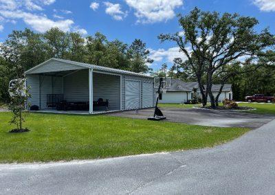 28X40X12 (28X25 Enclosed/ 28X15 Over Hang) (2) 10X10 Doors